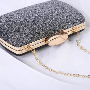 Elegante glänzende Abendtasche mit schwarzem Silberglitzer und goldener Kette für Damen