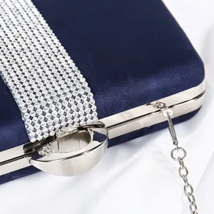 Dunkelblaue Samt-Abendtasche mit funkelndem Strassband und silbernem Metallrahmen