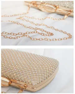 Close-up detail of golden box clutch bag with sparkling rhinestone embellishment