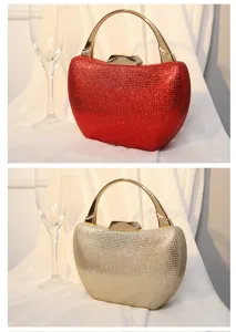 Elegante handgefertigte Abendtaschen mit Strasssteinen in Rot und Gold mit Metallgriffen