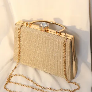 Elegante goldene Glitzer-Abendtasche mit Metallgriff und langer Umhängekette für Damen.