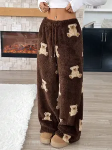 Cozy brown fuzzy lounge pants for women featuring cute teddy bear patterns and drawstring