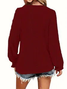 Detailed back view of a women's burgundy hollow-out blouse with elegant pleated sleeves