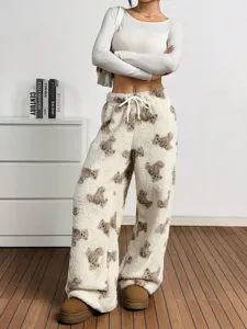 Cozy white fuzzy wide-leg trousers featuring cute brown bear patterns and drawstring waist