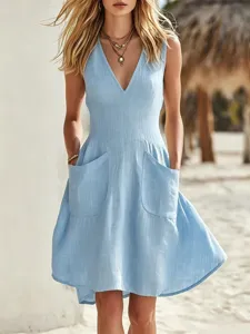 Close-up detail of a light blue cotton linen sleeveless V-neck casual dress with pockets