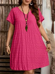 Casual pink V-neck loose dress with textured crinkle fabric detail for summer days