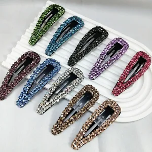 Lot de barrettes à cheveux colorées en strass en forme de goutte d'eau serties de diamants.
