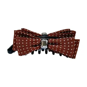 Elegant brown polka dot bow banana hair clip featuring a sparkling central rhinestone