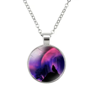 Detailed close-up view of a wolf howling at the moon pendant on a stainless steel chain