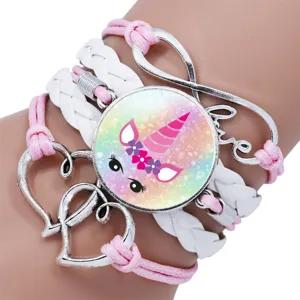 Close-up of pink and white multi-layer bracelet with unicorn and Love charms