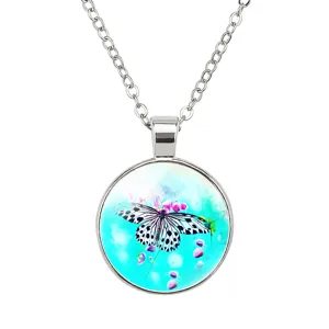 Detailed view of a 25mm round butterfly pendant with blue background and steel chain