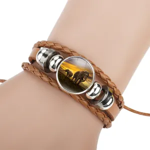 Bohemian multilayer brown braided leather bracelet featuring elephant sunset glass charm
