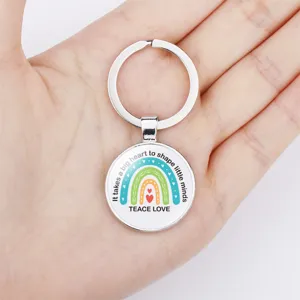 Teacher appreciation keychain with a colorful rainbow and red heart pendant detail