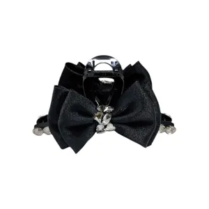 Elegante zwarte haarklem met strik en fonkelende K9-kristallen, modieus haaraccessoire