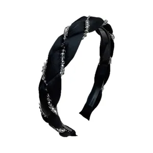 Elegante cerchietto nero intrecciato con cristalli grigi scintillanti per acconciature