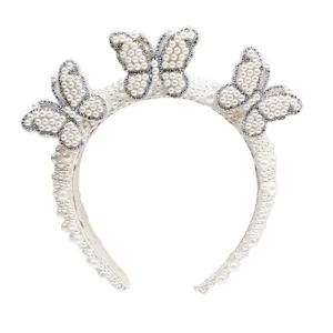 Elegant white bridal pearl headband with three exquisite pearl-encrusted butterfly motifs