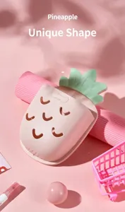 Detailed view of a pink pineapple-shaped wall-mounted storage box for bathrooms