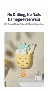 Detailed macro view of a pineapple-shaped wall-mounted toothbrush holder in a bathroom