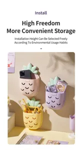 Close-up detail of wall-mounted pineapple storage boxes for bathroom organization