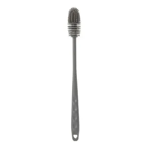 Close-up of a long-handled grey silicone bottle brush designed for deep bottle cleaning