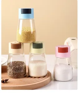 Set of four colorful quantitative spice jars on a wooden tray for kitchen salt and sugar storage