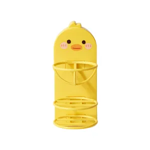 Close-up of a yellow duck-shaped wall rack designed for drying makeup sponges and puffs