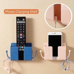 Self-adhesive wall-mounted phone charging rack and remote control holder with side hooks