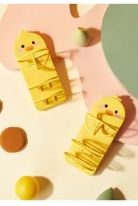 Cute yellow duck-shaped wall-mounted makeup sponge and puff drying rack holder