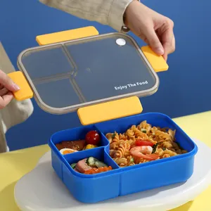 Moderne japanische blaue bento lunchbox aus kunststoff mit praktischen fächern