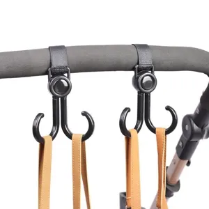 Zwarte multifunctionele dubbele haken voor kinderwagens en fietsen met verstelbare riemen