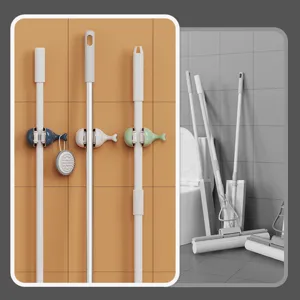 Self adhesive whale shaped mop holder wall mounted hook for bathroom organization