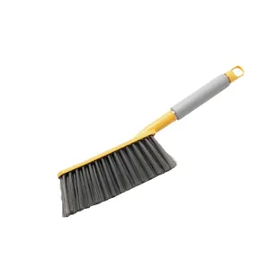 Long-handle cleaning brush with soft gray bristles for efficient bed and sofa dusting