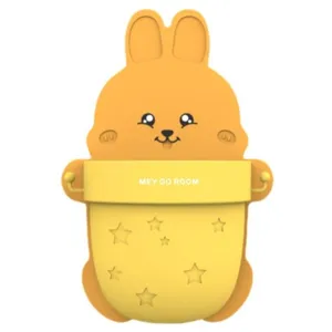 Detail of yellow rabbit wall-mounted storage cup with star patterns and side hooks