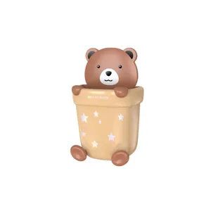 Close-up of a cute cartoon bear wall-mounted storage cup with stars and 'MEY GO ROOM' text.