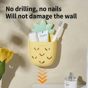 Cute pineapple-shaped wall-mounted bathroom storage rack for toothbrush and toothpaste