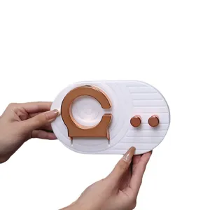 Luxury foldable wall-mounted hair dryer holder with rose gold accents and dual hooks