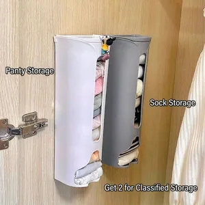 Detail of wall-mounted underwear and sock organizers installed on a cabinet door