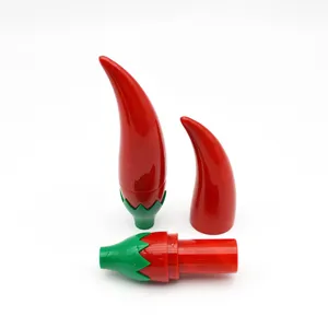 Creative chili pepper shaped sewing needle storage box and empty lipstick tube container.