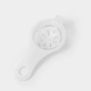 White plastic egg yolk white separator tool for kitchen baking usage