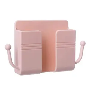 Pink wall-mounted phone charging bracket and remote control storage rack with hooks for home