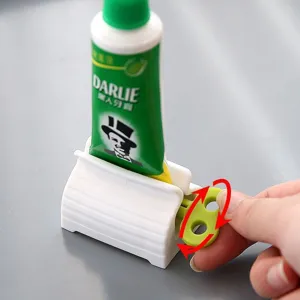 Efficient manual toothpaste squeezer and facial cleanser dispenser for home bathroom use