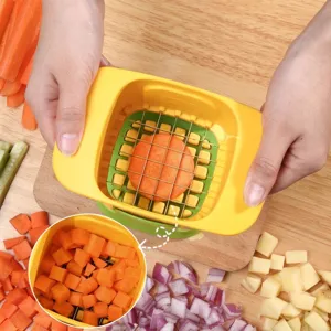 Manual vegetable dicer with stainless steel blades for dicing carrots and potatoes
