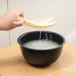 Ergonomic cream-colored multifunctional rice washer and strainer spoon for kitchen use