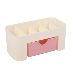 Vista dettagliata dell'organizzatore cosmetico crema con cassetto rosa e scomparti