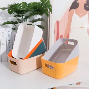 Juego de cajas de almacenamiento de plástico de colores con asas para organizar el hogar