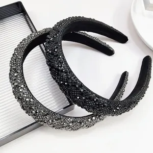 Close-up detail of luxurious sparkling rhinestone padded headbands for party