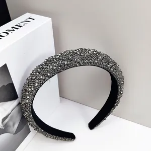 Detail view of high-end elegant grey rhinestone padded headband for party accessories
