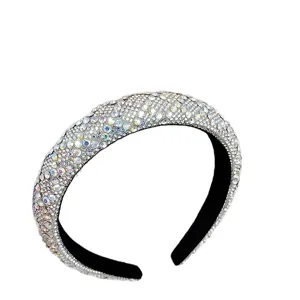 Elegant luxury padded headband fully covered with sparkling crystals and rhinestones.