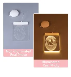 LED hanglamp voor Pasen in de vorm van een ei met kuiken, verlicht en onverlicht