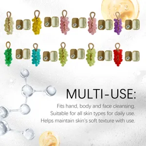Collection of colorful grape-shaped soaps with functional text description